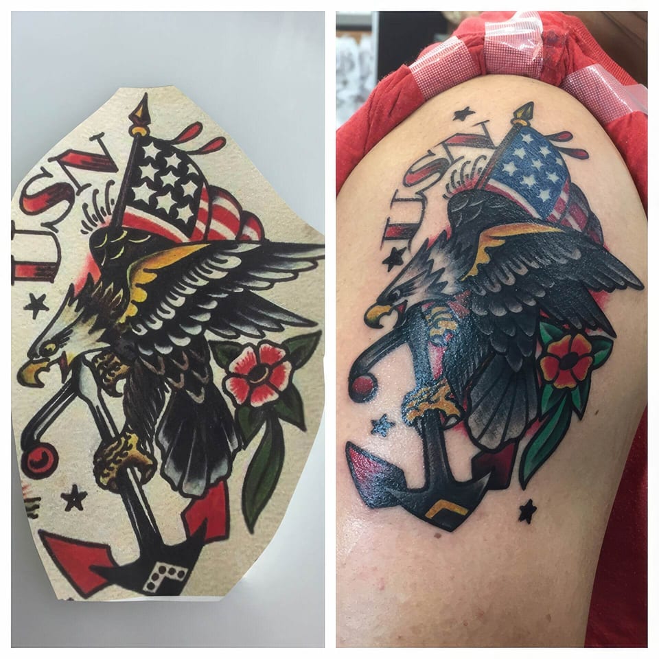 A traditional eagle, anchor and American flag cover the upper arm beside the matching flash drawing.