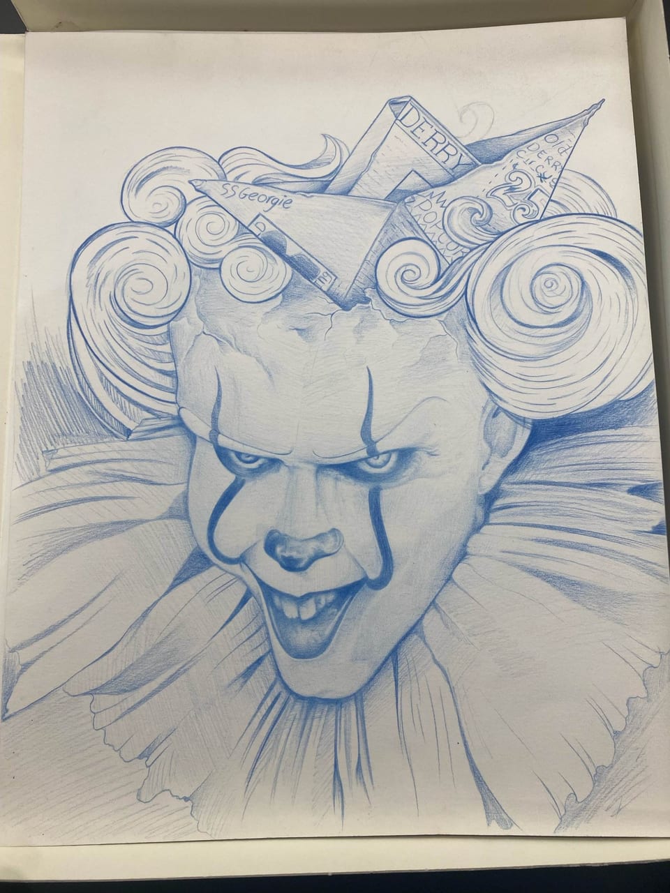 A pencil drawing of a sinister-looking clown with exaggerated features, detailed ruffled collar, and a paper boat hat labeled "SS Georgie," perfect for your Friday the 13th specials.